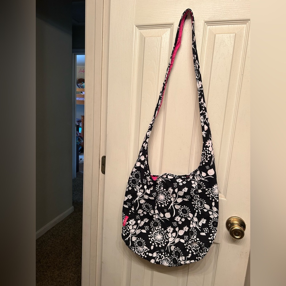 Thirty-One Reversible Hobo Crossbody Black &White floral and Hot Pink